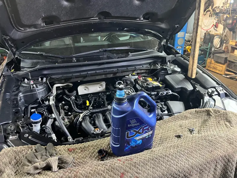 Mazda: крупное ТО: масла во всех агрегатах и чистка впуска, фото 1 из 3
